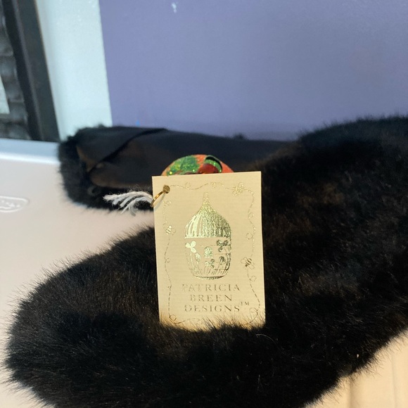 Brand new Patricia Breen Halloween Santa on Pumpkin ornament.